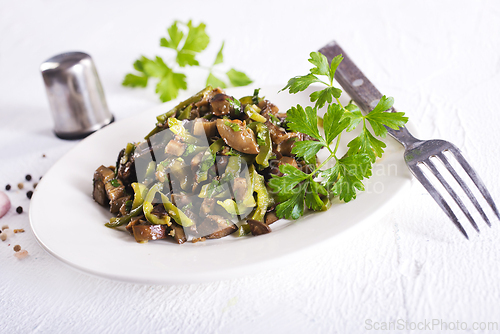 Image of Eggplants with green tomatoes, paprika, carrot, onion and garlic.