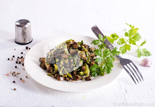 Image of Eggplants with green tomatoes, paprika, carrot, onion and garlic.