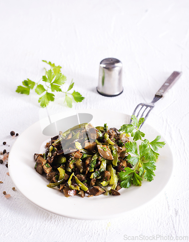 Image of Eggplants with green tomatoes, paprika, carrot, onion and garlic.