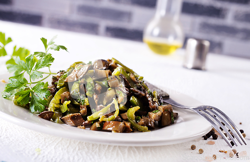 Image of Eggplants with green tomatoes, paprika, carrot, onion and garlic.