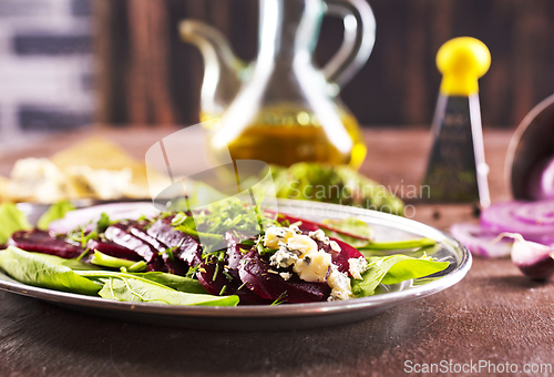 Image of Tasty salad of beetroot, cheese and nuts. Copy space.