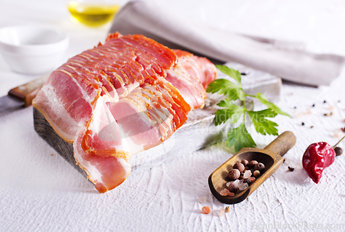 Image of smoked bacon slices for hot pot on a table
