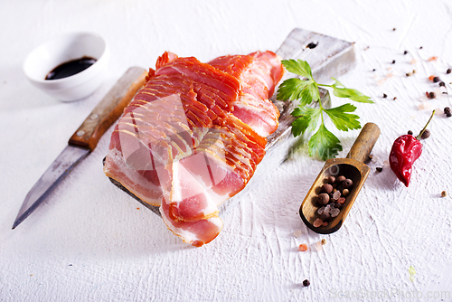 Image of smoked bacon slices for hot pot on a table