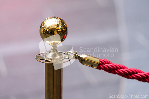 Image of Golden pole rope barrier