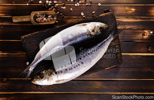 Image of Herring or Baltic herring on wooden table