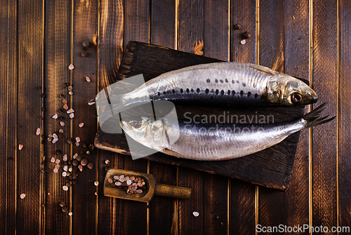 Image of Herring or Baltic herring on wooden table