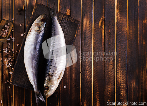 Image of Herring or Baltic herring on wooden table