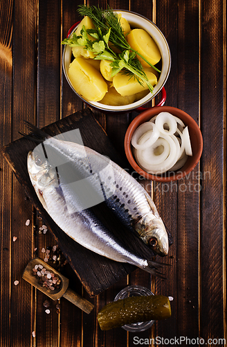 Image of Herring or Baltic herring on wooden table
