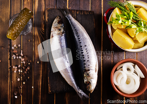 Image of Herring or Baltic herring on wooden table