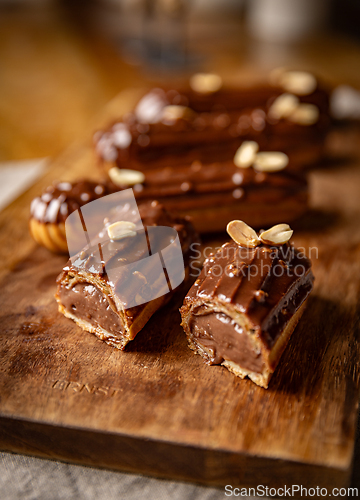 Image of Chocolate eclairs topped with peanuts