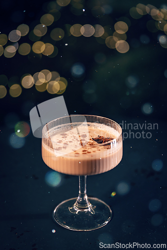Image of Eggnog cocktail decorated with star anise
