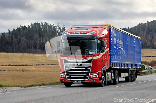 Image of Red DAF XG 480 Truck Semi Trailer on Road