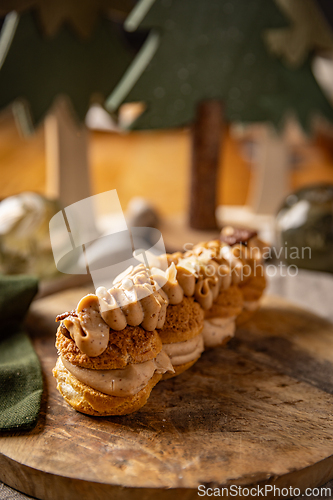 Image of Delicious Christmas eclair showing chestnut cream