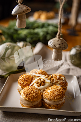 Image of Delicious cream puffs forming flower shape