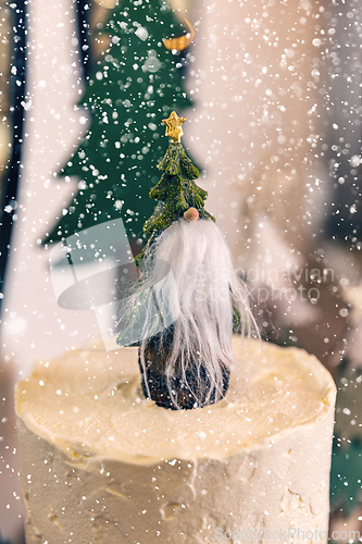 Image of Christmas cake decorated with a cute gnome