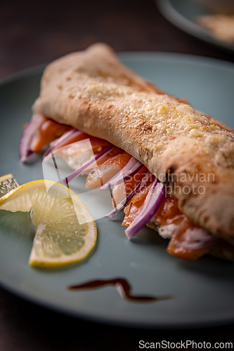 Image of Delicious closed calzone pizza