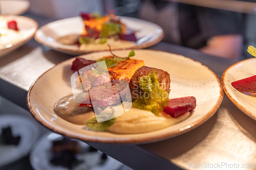 Image of Plates with roasted meat