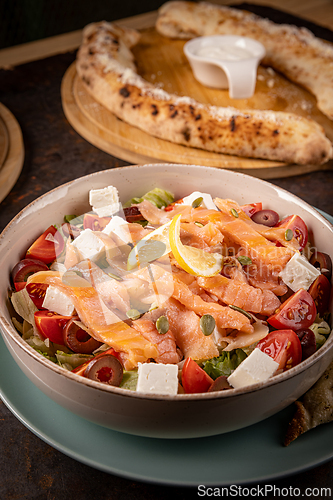 Image of Fresh salmon salad with feta cheese
