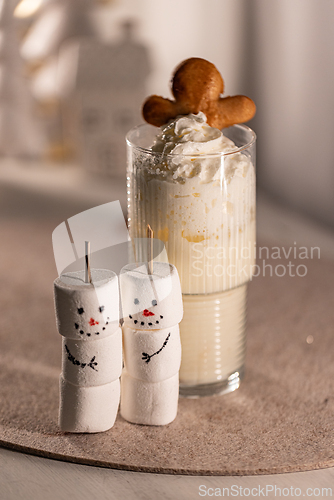 Image of Eggnog topped with whipped cream