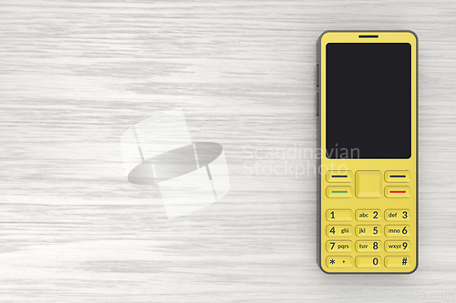 Image of Yellow mobile phone