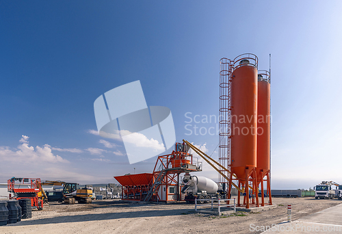 Image of Concrete mixing plant with truck