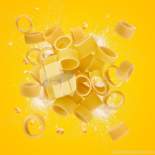 Image of Raw calamarata pasta flying