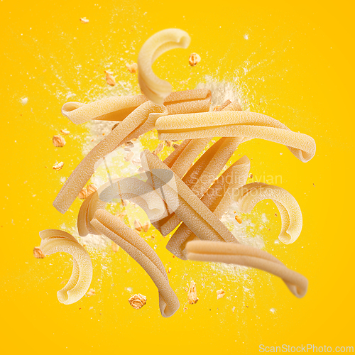 Image of Caserecce pasta exploding with flour