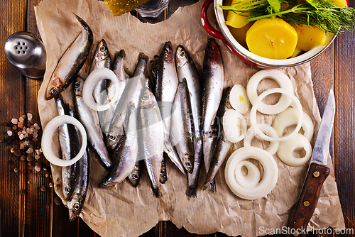 Image of Salted Baltic fish with potato and onion
