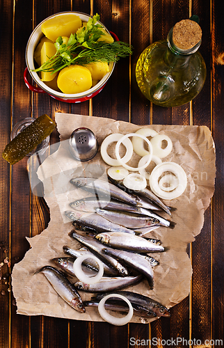 Image of Salted Baltic fish with potato and onion