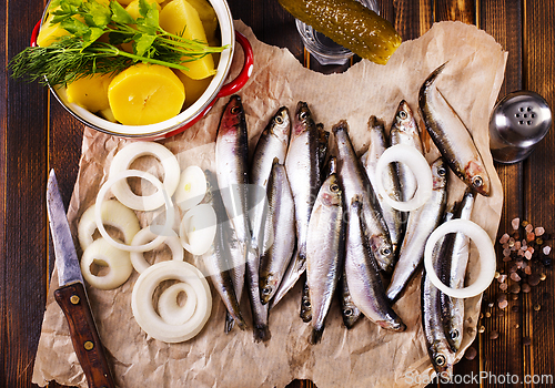 Image of Salted Baltic fish with potato and onion