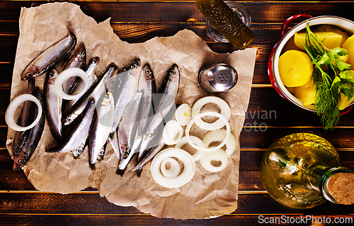 Image of Salted Baltic fish with potato and onion