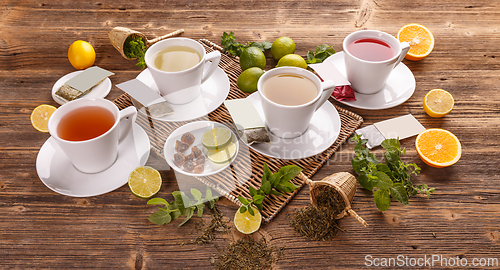 Image of Four teacups with different teas