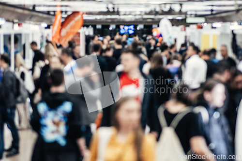 Image of Abstract blurred people at exhibition hall of expo event trade show. Business convention show or job fair. Business concept background.
