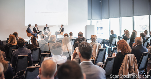 Image of Interview and round table discussion at business convention and presentation. Audience at the conference hall. Business and entrepreneurship symposium