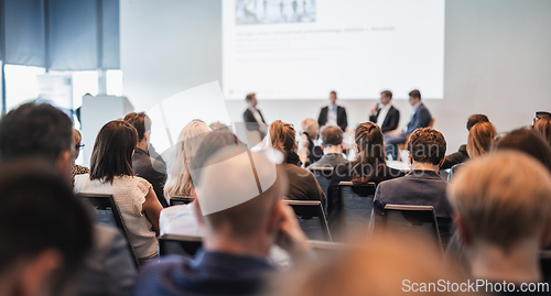 Image of Interview and round table discussion at business convention and presentation. Audience at the conference hall. Business and entrepreneurship symposium