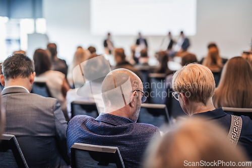 Image of Interview and round table discussion at business convention and presentation. Audience at the conference hall. Business and entrepreneurship symposium