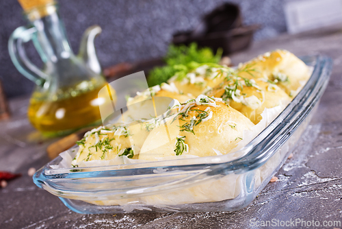 Image of lush homemade buns with garlic and dill