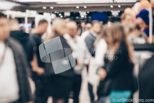 Image of Abstract blurred people at exhibition hall of expo event trade show. Business convention show or job fair. Business concept background.