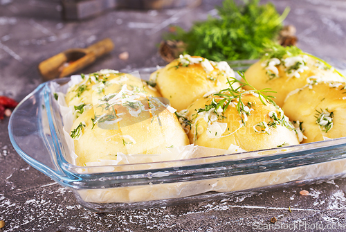 Image of lush homemade buns with garlic and dill