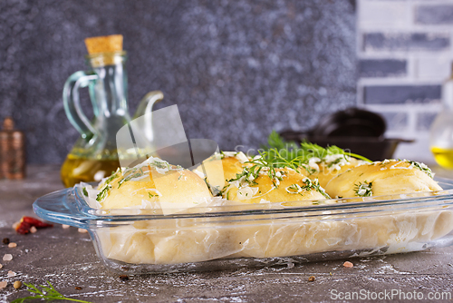Image of lush homemade buns with garlic and dill