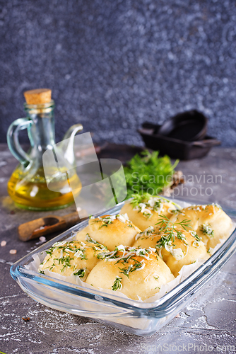 Image of lush homemade buns with garlic and dill