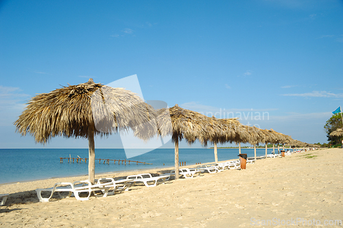 Image of Beach with parasols and sunbeds