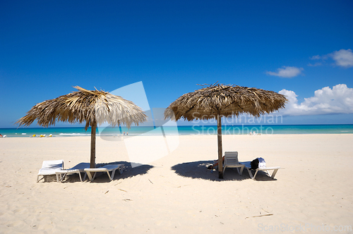 Image of Beach with parasols and sunbeds