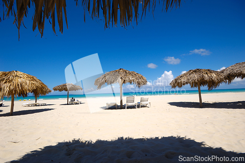 Image of Beach with parasols and sunbeds