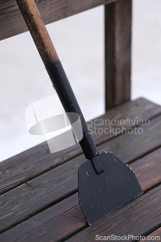 Image of Ice scraper tool with a metal blade