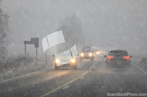 Image of Driving in Highway Traffic in Bad Weather