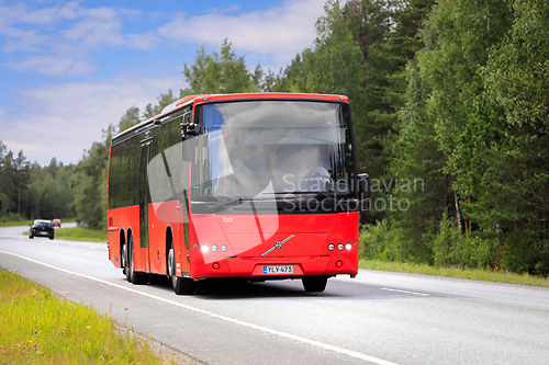 Image of Red Volvo 8700LE Bus on Road
