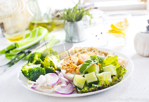 Image of Fresh vegetable salad with broccoli, cucumber and other vegetables