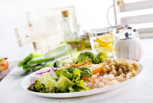 Image of Fresh vegetable salad with broccoli, cucumber and other vegetables