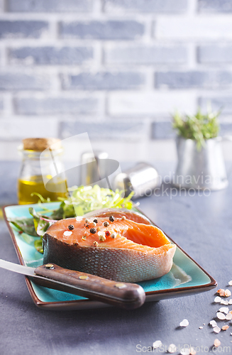Image of Fresh raw salmon steak with spices. Healthy seafood food